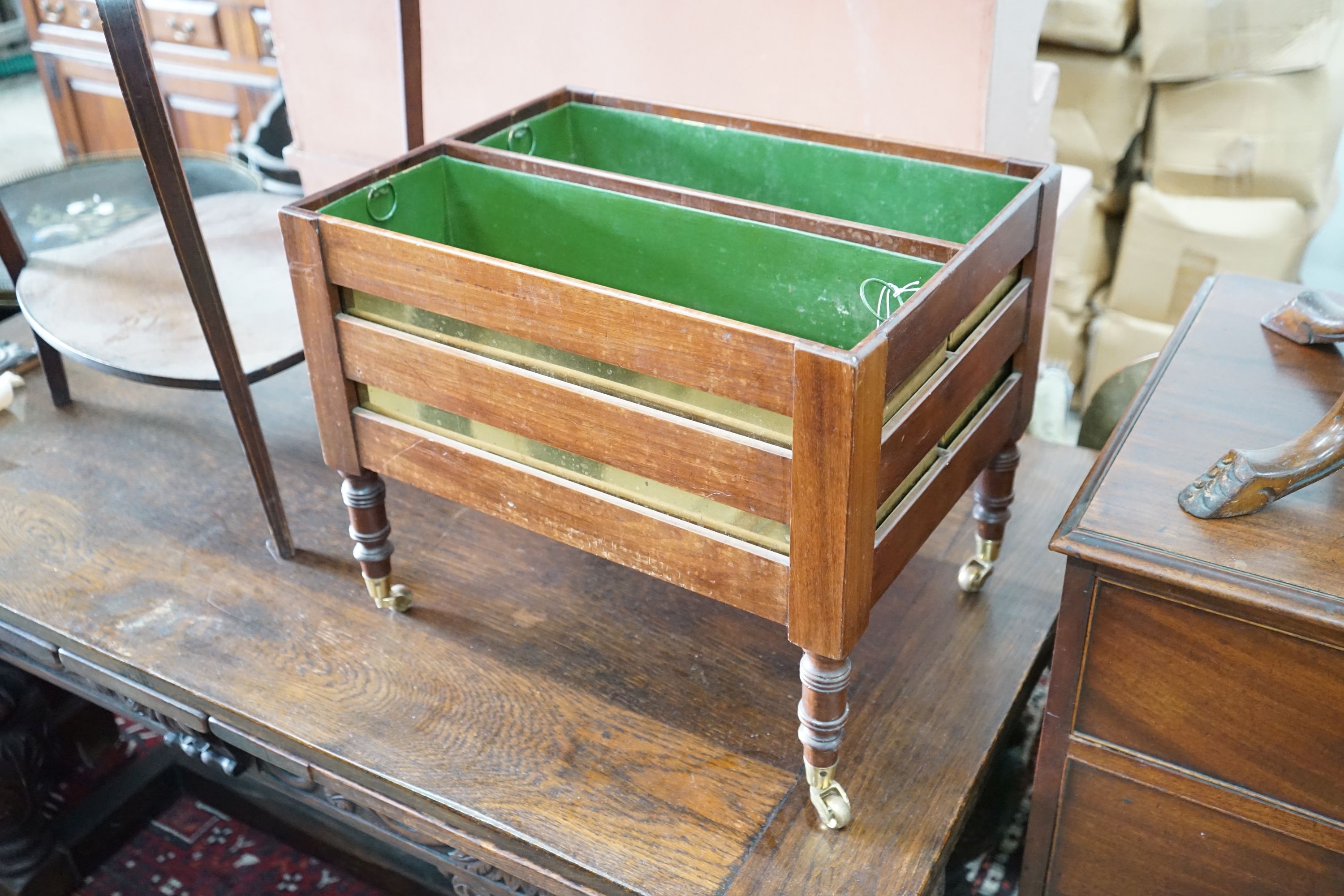 A 19th century mahogany two division planter with brass liners converted from a Canterbury, width 50cm, depth 38cm, height 42cm